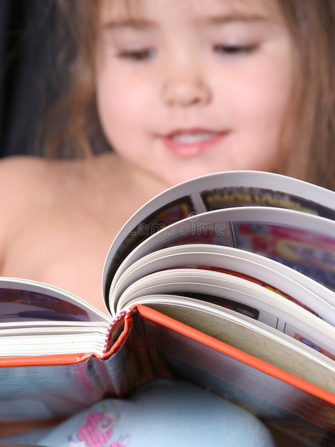 Toddler Reading a Book stock photo. Image of informal 1777428