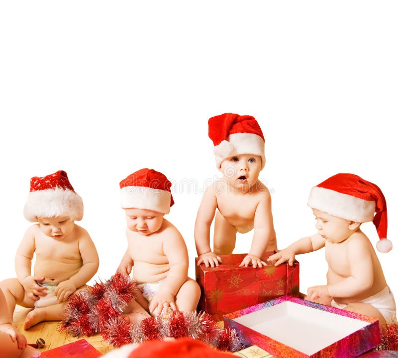 Toddlers in Christmas hats