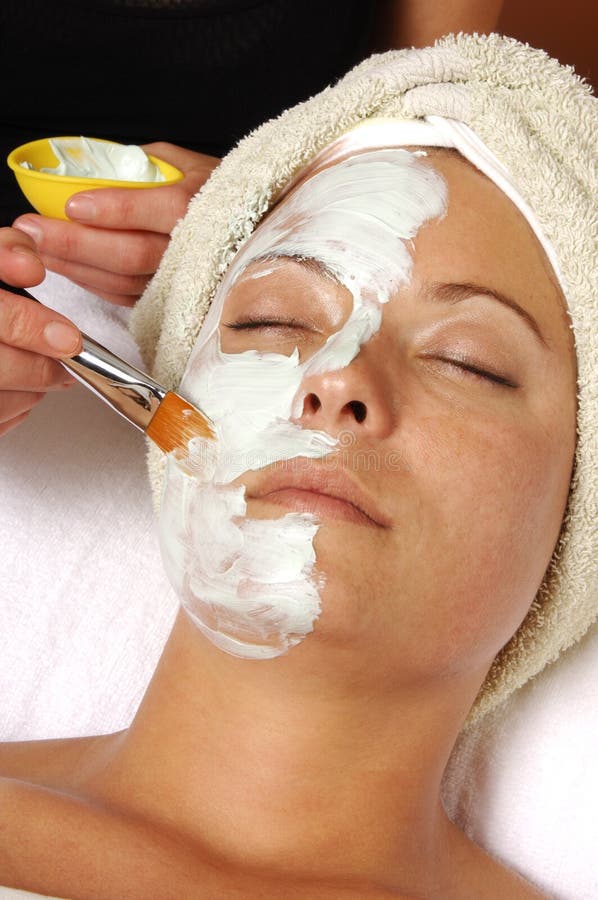 Spa beauty organic facial mask application at day spa salon. Spa beauty organic facial mask application at day spa salon