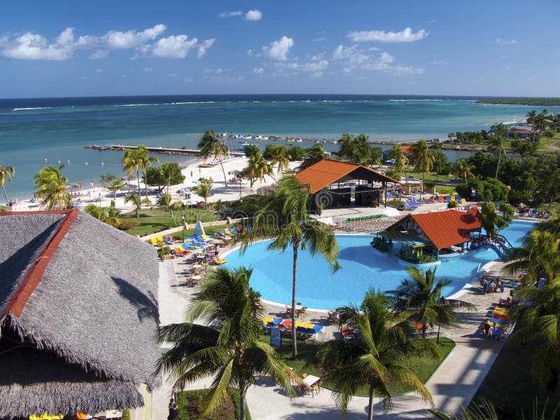 High view of Las Brisas hotel in Guardalavaca (Cuba) with swimming pool, beach and sea. High view of Las Brisas hotel in Guardalavaca (Cuba) with swimming pool, beach and sea