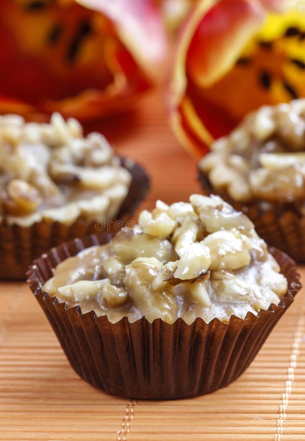Toffee cupcakes stock image. Image of buns, lined, table 57043077