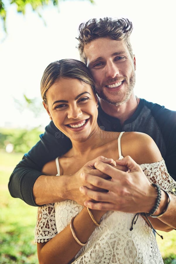 Together Forever And Ever Portrait Of A Young Couple Bonding Together Outdoors Stock Image 