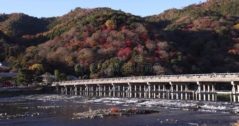 Togetsukyo bridge near Katsuragawa river in Kyoto in autumn