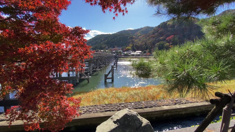 Togetsukyo bridge near Katsuragawa river in Kyoto in autumn