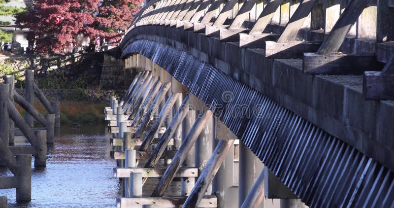 Togetsukyo bridge near Katsuragawa river in Kyoto in autumn telephoto shot