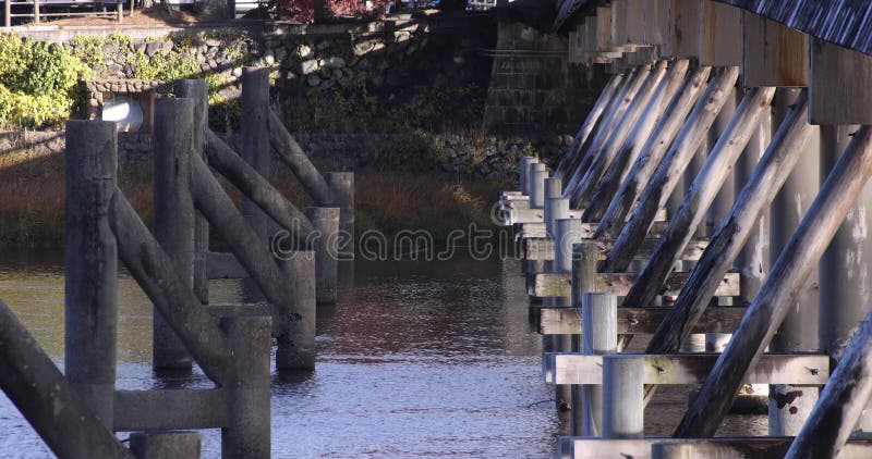 Togetsukyo bridge near Katsuragawa river in Kyoto in autumn telephoto shot