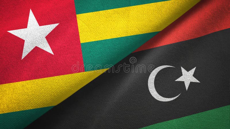 Togo and Libya two flags textile cloth, fabric texture royalty free illustration