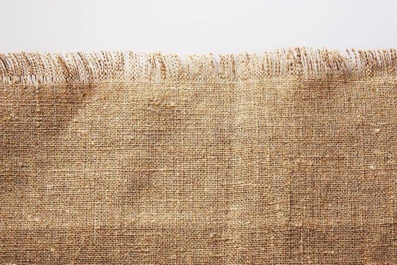 Toile de jute avec le bord frangé image stock Toile de jute avec le bord frangé image stock
