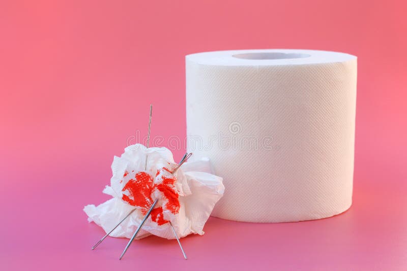 Toilet Paper And Blood Concept Of Hemorrhoid Treatment Stock Photo