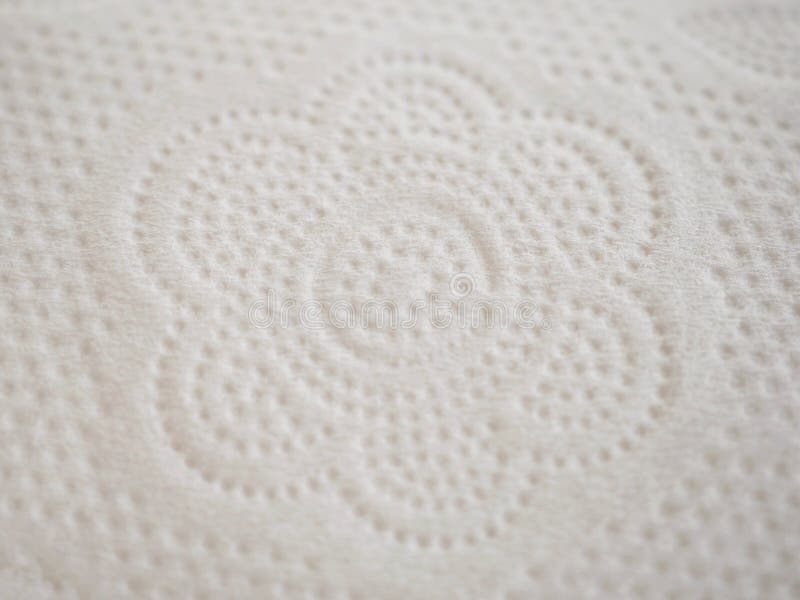 Toilet Paper Flower Pattern Embossed on White Paper Texture Stock Image