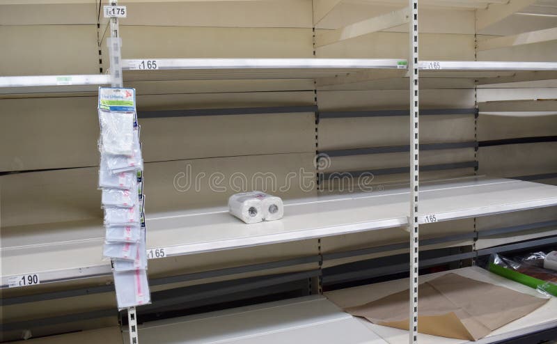 Toilet paper. Supermarket shelves in the UK empty as people panic buy loo roll / toilet paper due to the coronavirus epidemic