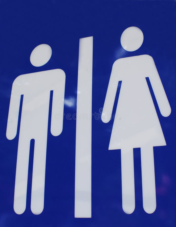 Maschio femmina servizi igienici segni su sfondo blu.