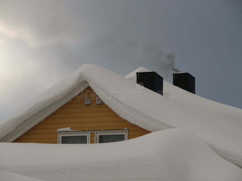 Roof with lots of snow. TromsÃ¸ is situated in the arctic region of Norway - and heavy snowfall is common. Roof with lots of snow. TromsÃ¸ is situated in the arctic region of Norway - and heavy snowfall is common.