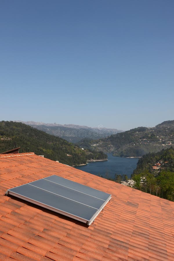 Red roof with a solar panel. Red roof with a solar panel