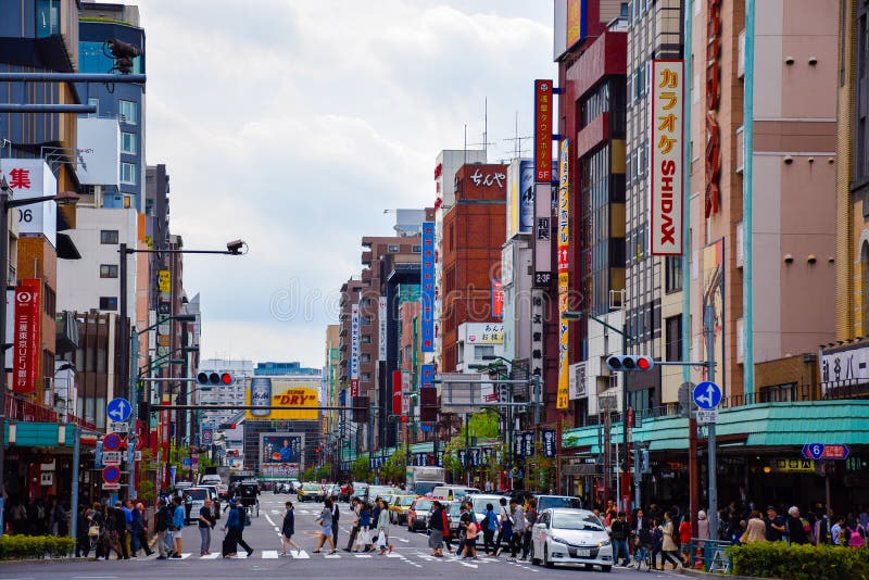 Tokyo, Japan-April 23, 2016: People are crossing the road in Asakusa stock photos Tokyo, Japan-April 23, 2016: People are crossing the road in Asakusa stock photos