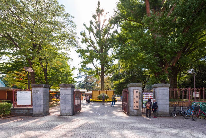 TOKYO, JAPAN - OCTOBER 31, 2017: View of the gate of Shinjuku park. Copy space for text. TOKYO, JAPAN - OCTOBER 31, 2017: View of the gate of Shinjuku park. Copy space for text