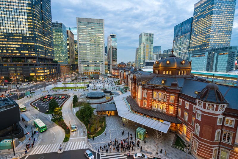 Tokyo Station, Tokyo, Japan - December 26, 2018: Railway or train station in Marunouchi surround by cityscape of business district stock images Tokyo Station, Tokyo, Japan - December 26, 2018: Railway or train station in Marunouchi surround by cityscape of business district stock images