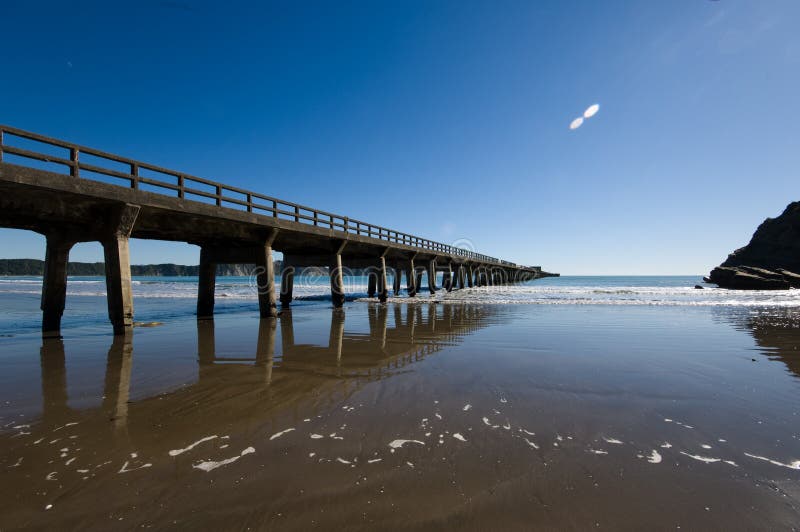 Concrete Foundation Pilings of Tolaga Bay Wharf NZ Stock Photo Image