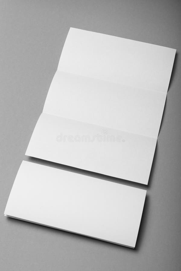 Tom trifold menymodell, vitbokmapp arkivbilder Tom trifold menymodell, vitbokmapp arkivbilder