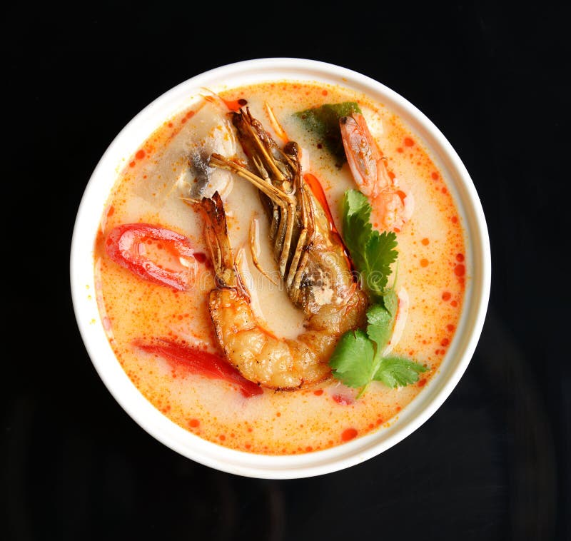 Tom yam kong or Tom yum spicy Thailand Dish Cuisine soup with king prawn chili pepper and mashrooms royalty free stock image Tom yam kong or Tom yum spicy Thailand Dish Cuisine soup with king prawn chili pepper and mashrooms royalty free stock image