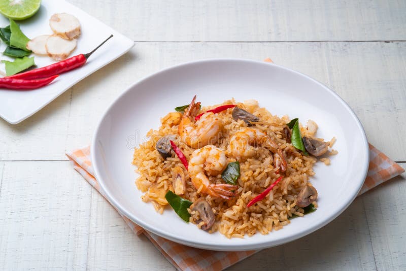 Tom Yum Fried Rice with prawns and Straw mushroom stock images