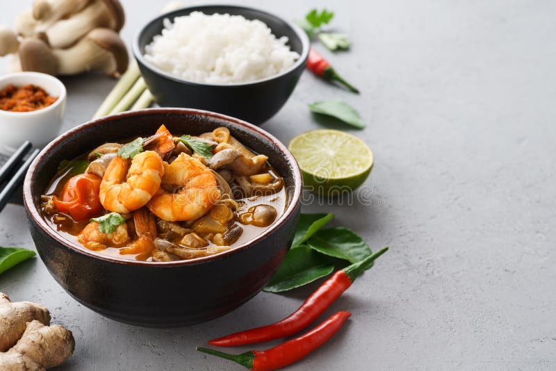 Tom Yum Goong or Tom Yum Kung spicy Thai soup and ingredients royalty free stock photo Tom Yum Goong or Tom Yum Kung spicy Thai soup and ingredients royalty free stock photo
