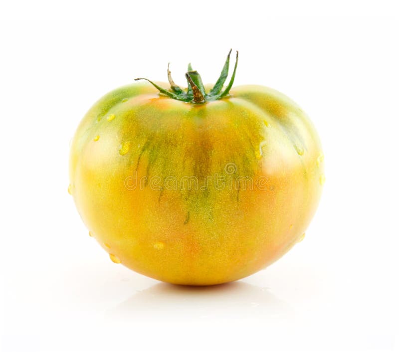 Tomate jaune mûre d'isolement sur le blanc photographie stock libre de droits Tomate jaune mûre d'isolement sur le blanc photographie stock libre de droits