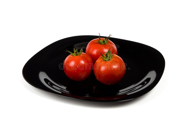 Tomaten Auf Schwarzer Platte Stockbild - Bild von hintergrund ...
