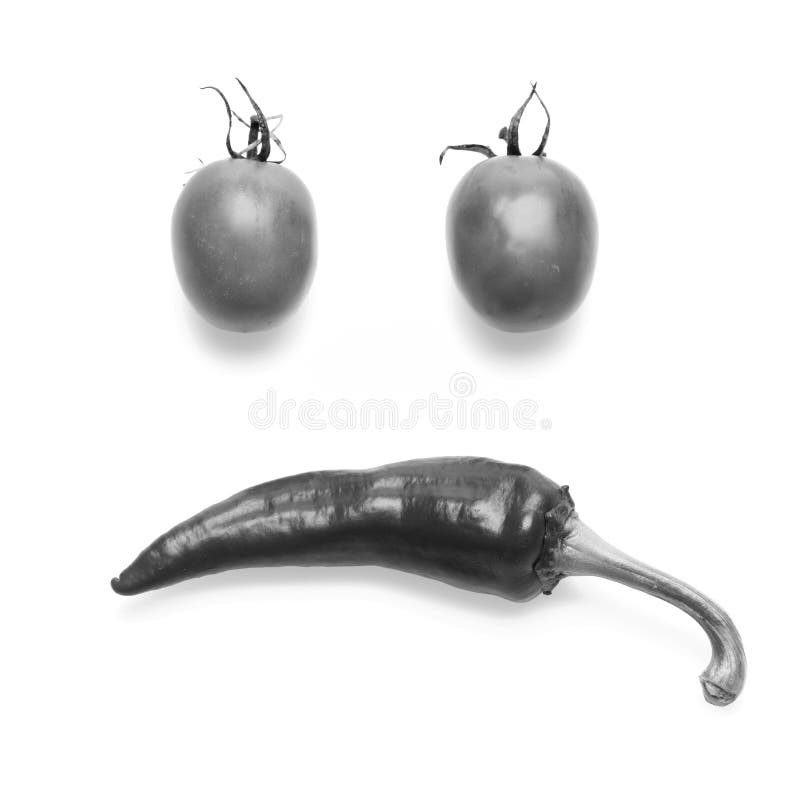 Tomates et poivre de piment faisant le visage Baies de tomate photo libre de droits Tomates et poivre de piment faisant le visage Baies de tomate photo libre de droits