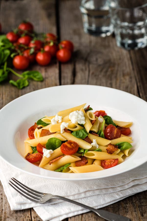 Tomato and Bacon Penne Pasta Stock Image Image of garlic, background