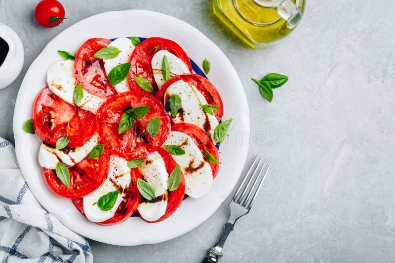 Tomato, basil, mozzarella Caprese salad with balsamic vinegar and olive oil