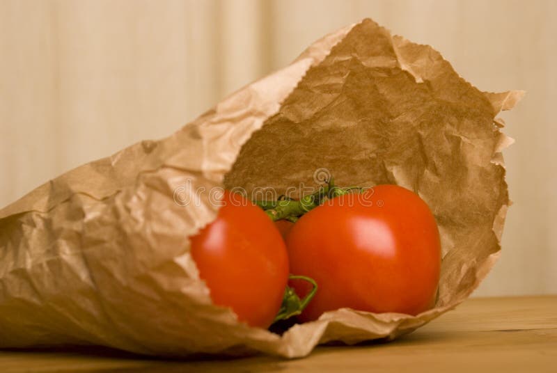 Tomato In Brown Paper Bag Picture. Image 4901267
