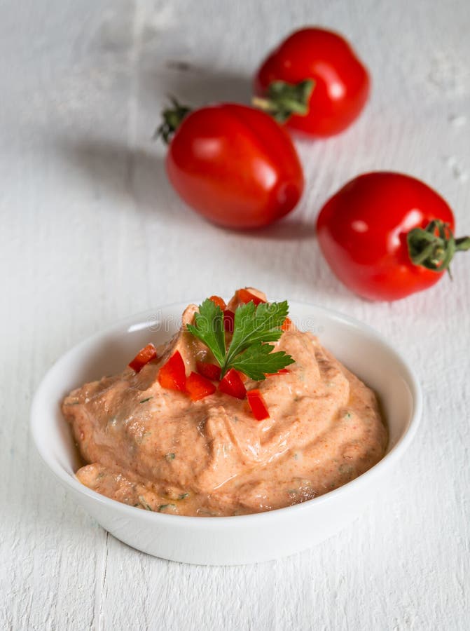 Tomato dip with fresh parsley and herbs