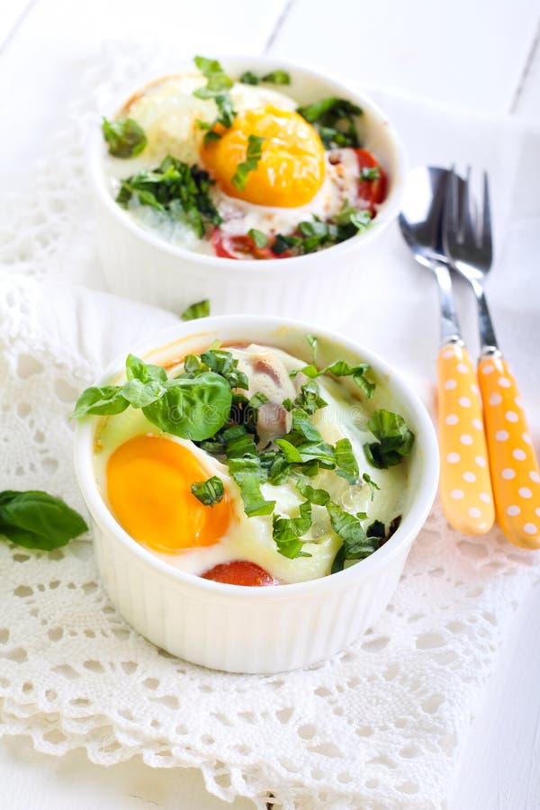 Tomato and egg bake stock image. Image of basil, treat 58932843