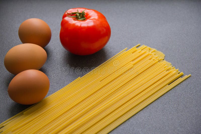 Tomato, Eggs and Pasta on a Gray Table Stock Photo Image of nutrition