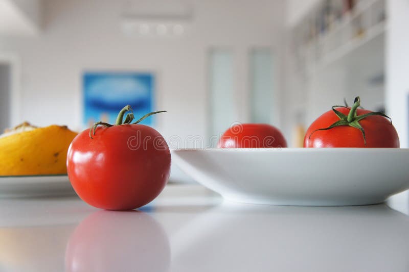 Tomato in the kitchen stock image. Image of house, bright 32093137