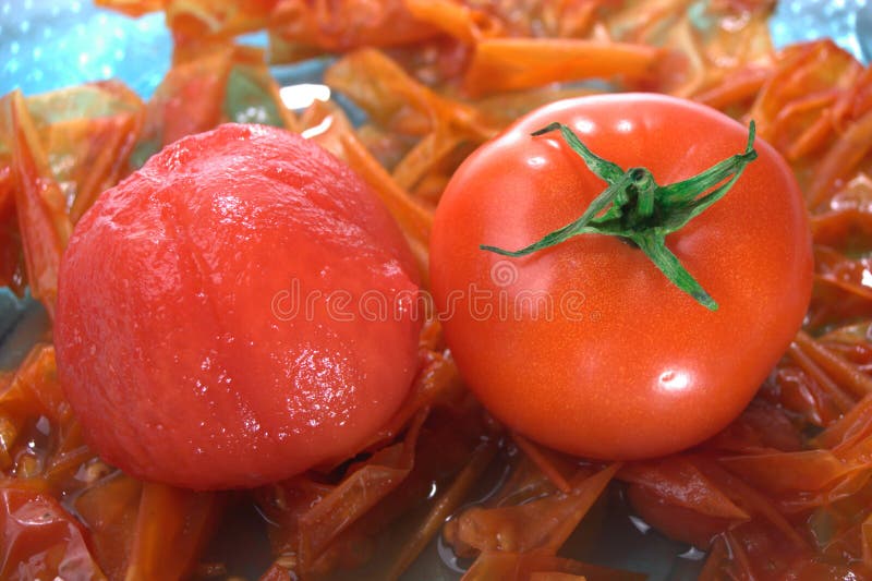 Tomato peeled and unpeeled stock photo. Image of cherry 10782926