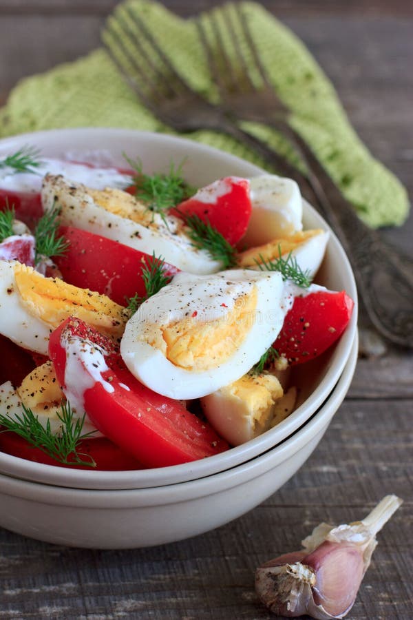 Tomatoes and eggs salad stock photo. Image of gray, dinner 44980736