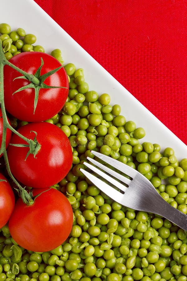 Tomatoes and Peas stock photo. Image of eating, boiled 25070864