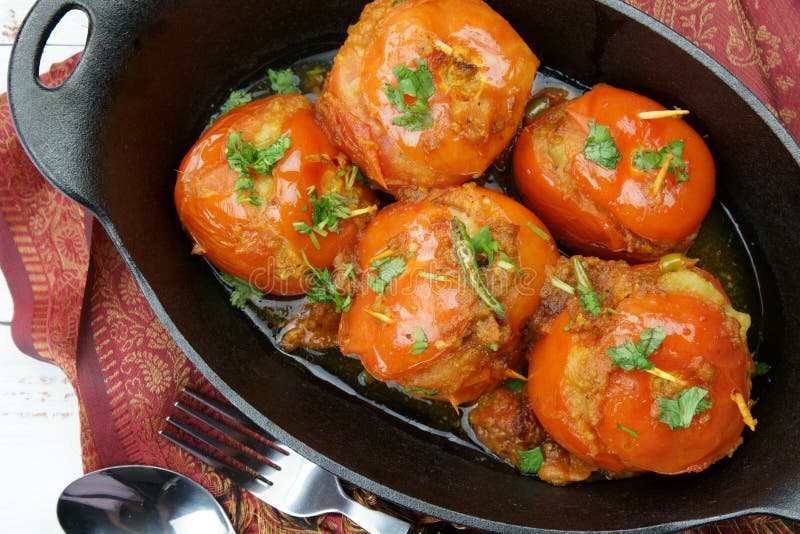 Tomatoes Stuffed with a Spicy Mixture of Mashed Potatoes in an Indian