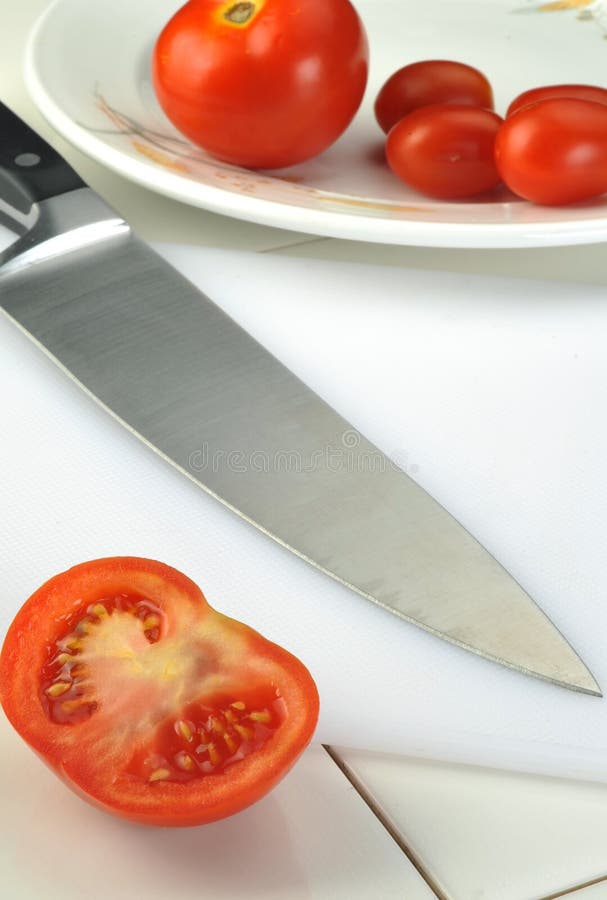 Chef Knife on Wooden Chopping Board with Fresh Vegetables Background.  Healthy Eating Concept. Vegetarian Raw Food Stock Photo - Alamy