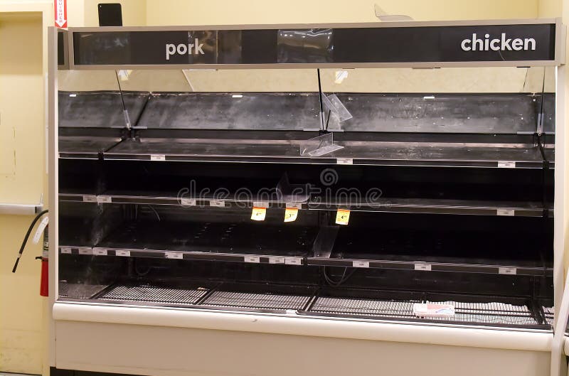 Tomma butikshyllor visar brist på mat, eftersom coronavirus fruktar att folk ska köpa mer