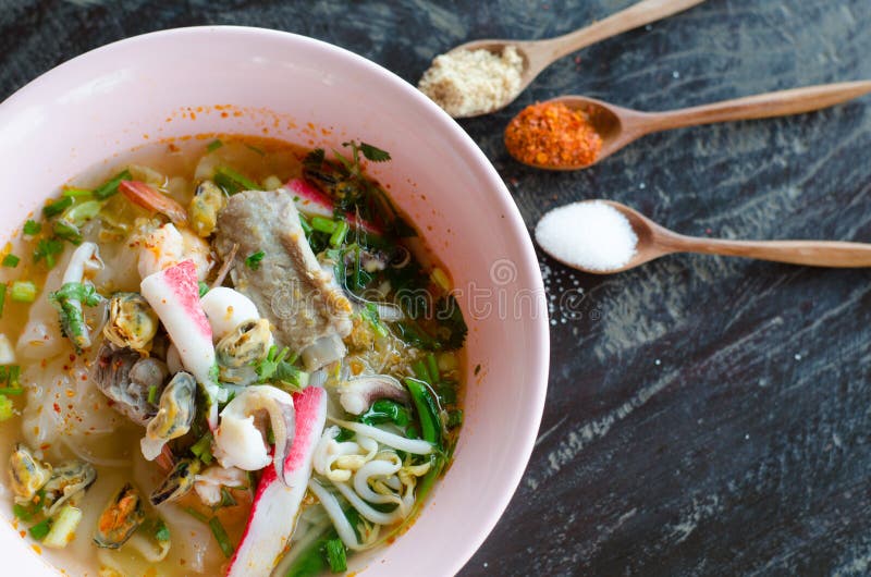 Tomyum noodle with seafood and flavoring