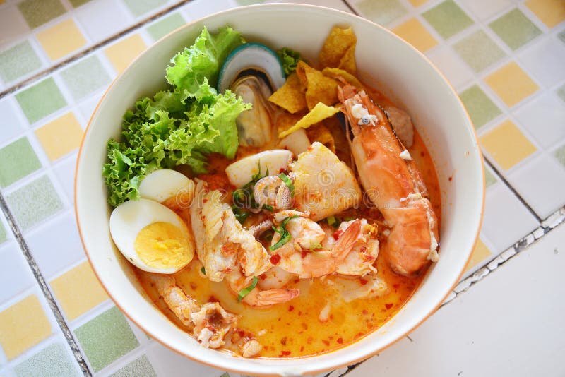 Spicy tomyum noodle with seafood