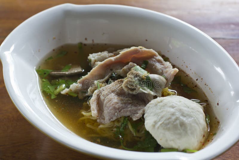 Spicy noodle soup with pork and meatball. Spicy noodle soup with pork and meatball