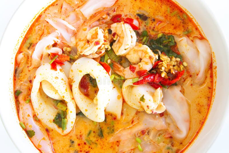 Spicy seafood noodle in coconut soup, Thailand style. Spicy seafood noodle in coconut soup, Thailand style.