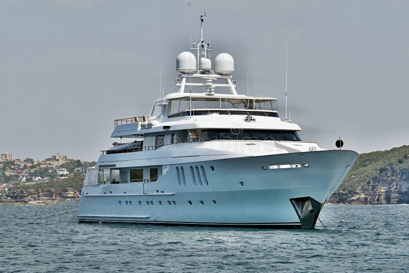 A 90 ton plus, luxury cruising motor Super Yacht at anchor in Sy stock photography A 90 ton plus, luxury cruising motor Super Yacht at anchor in Sy stock photography