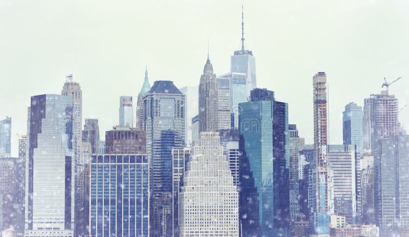 Toned photo New York City Manhattan downtown skyline at winter day during snowfall