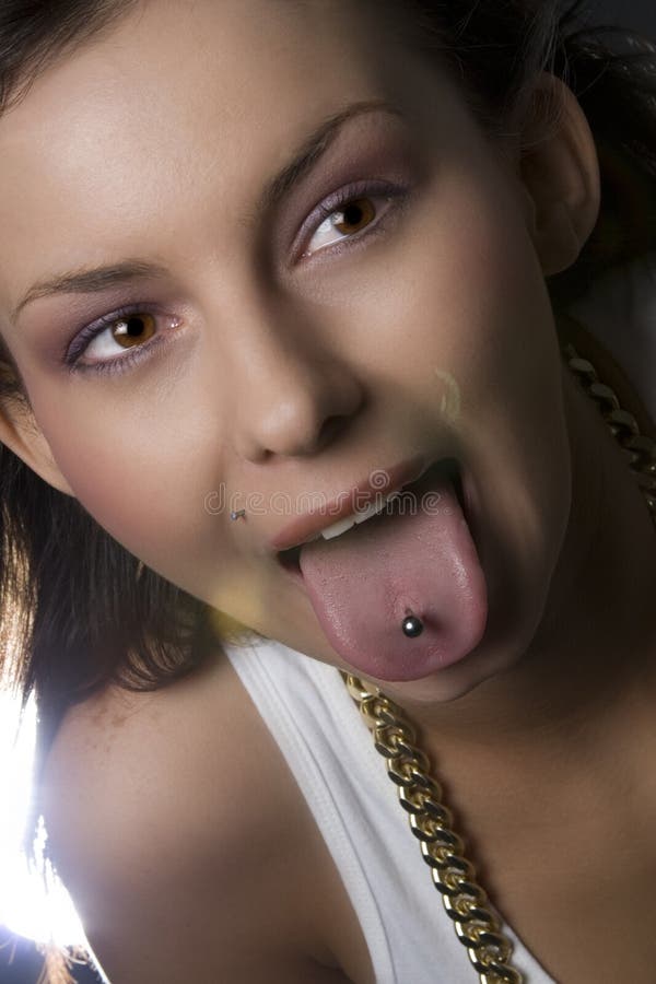 Tongue ring girl royalty free stock photography.