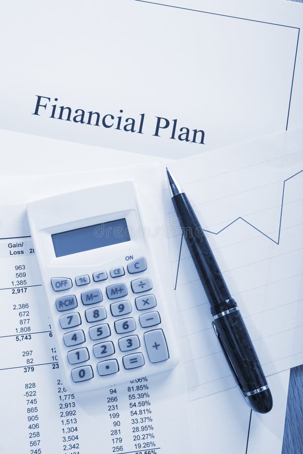 Financial plan and associated requirements - graph, figures, pencil, calculator. Financial plan and associated requirements - graph, figures, pencil, calculator